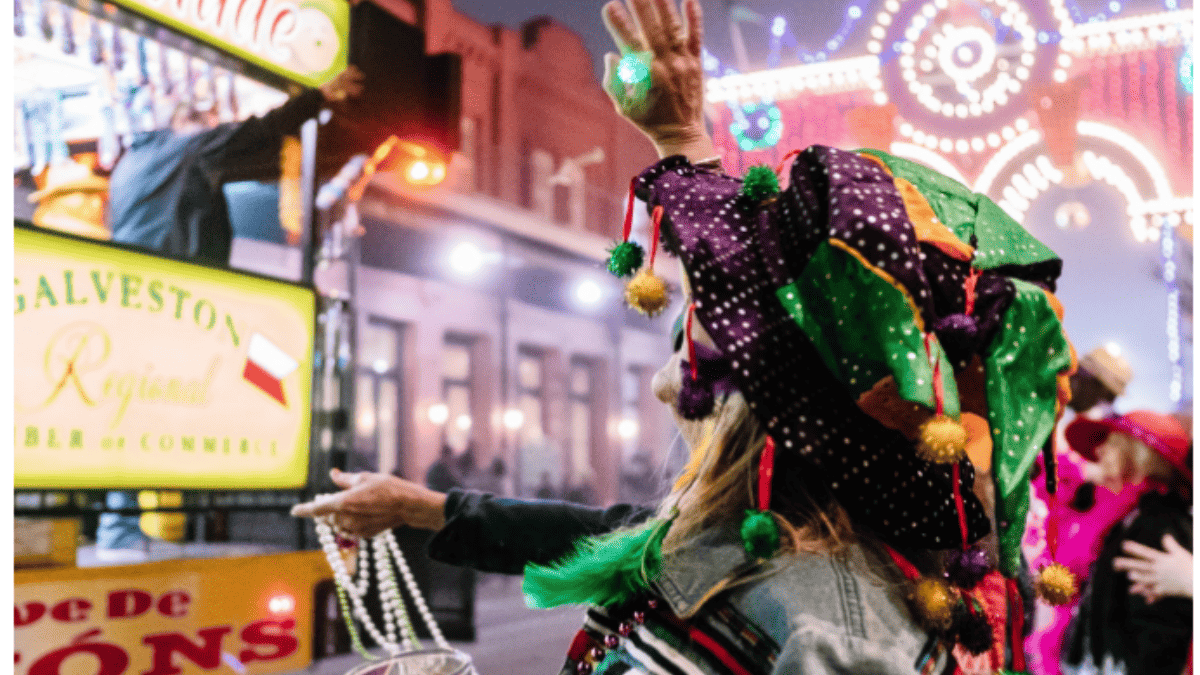 woman watching parade at mardi gras galveston